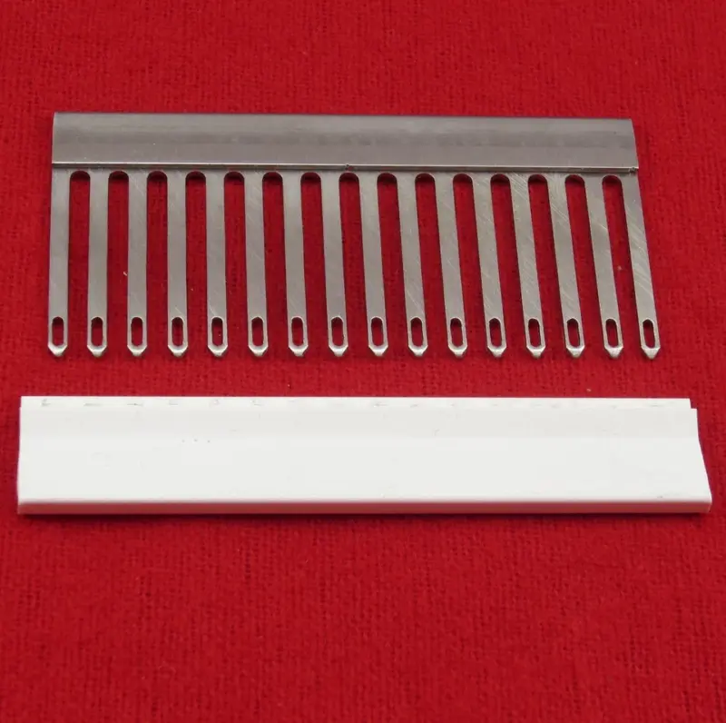 s-l960-1.webp Deckerkamm 4,5 mm – 16 Maschen mit Kappe